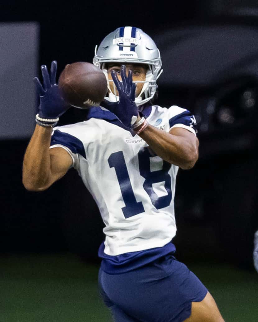 Dallas Cowboys wide receiver Jalen Tolbert catches a pass during a minicamp practice at The...