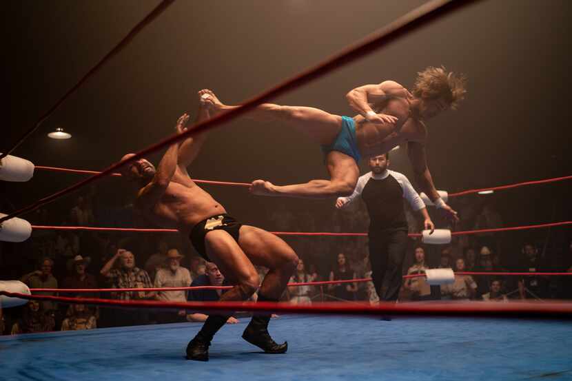 Zach Efron launches a mid-air dropkick in a scene from "The Iron Claw."