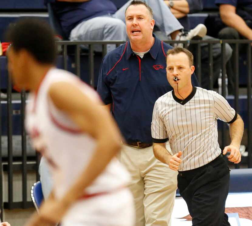 Allen head coach Jeff McCullough shouts directions to his team during the second quarter as...