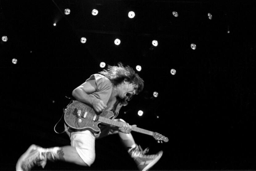 8/5/93: Eddie Van Halen jumps at the  conclusion of of one his groups songs while performing...