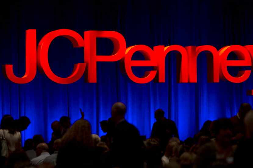 J.C. Penney employees find their seats before a presentation of CEO Marvin Ellison during...