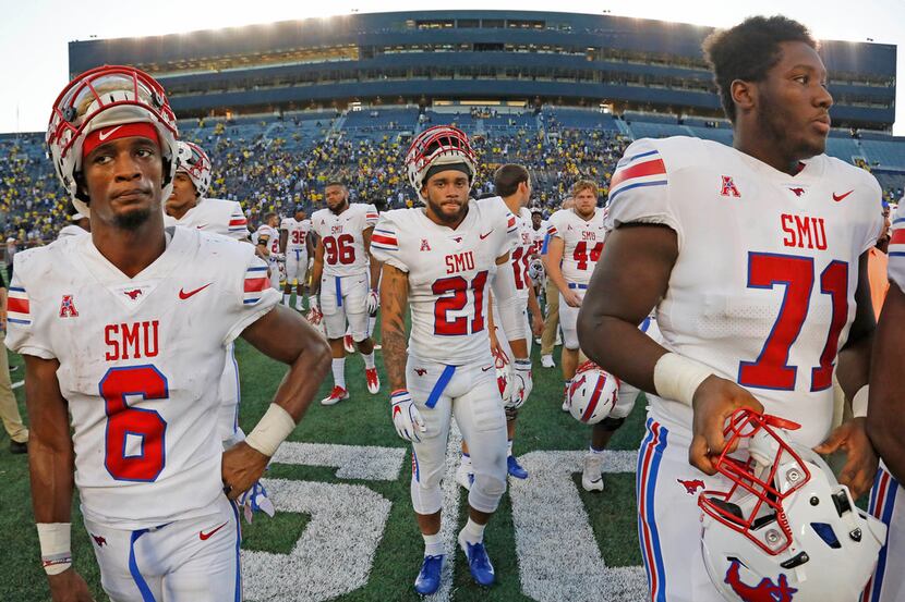 Southern Methodist Mustangs Braeden West (6), Cole Sterns (21), and Southern  Jaylon Thomas...