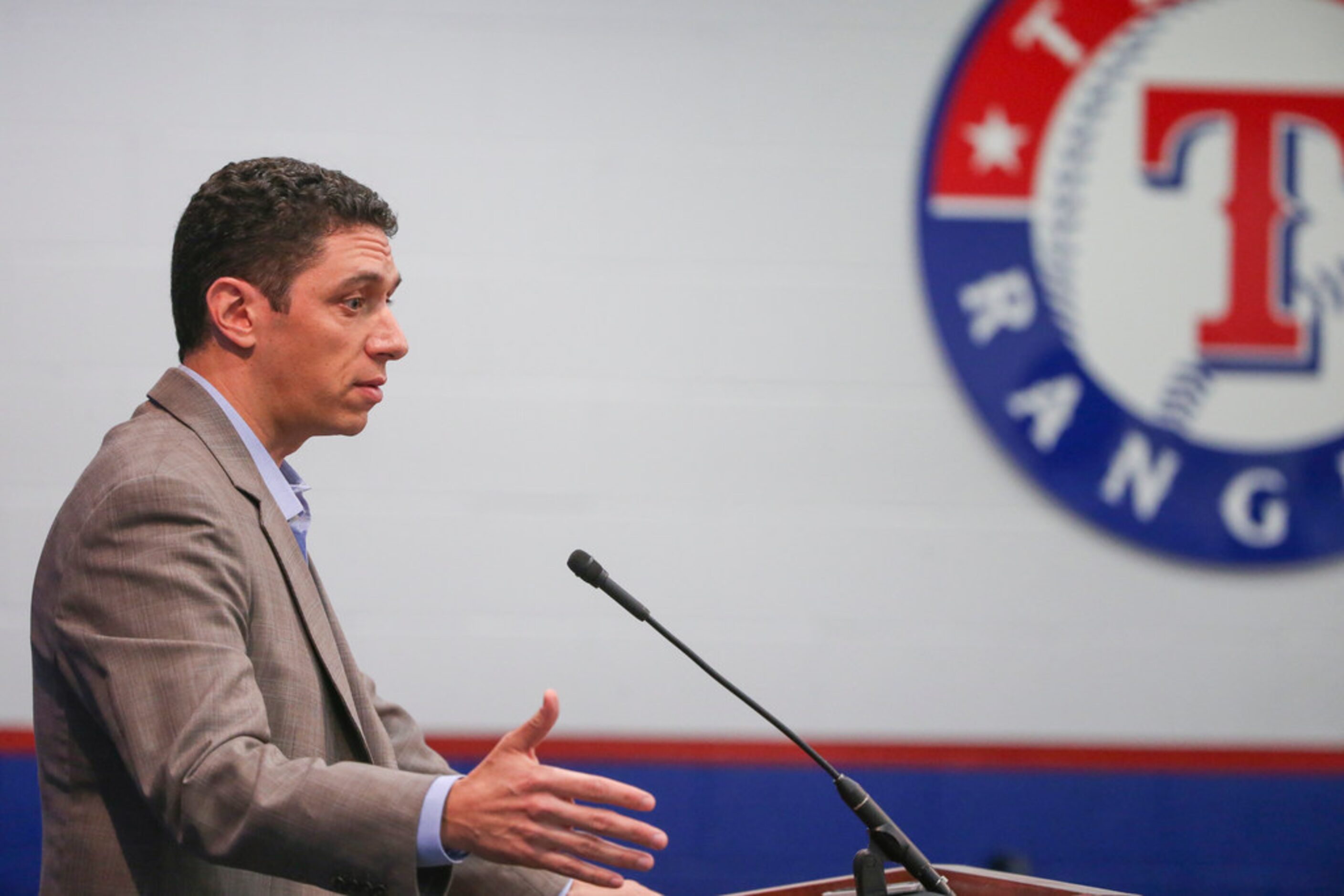 Rangers President of Baseball Operations and General Manager Jon Daniels addresses members...