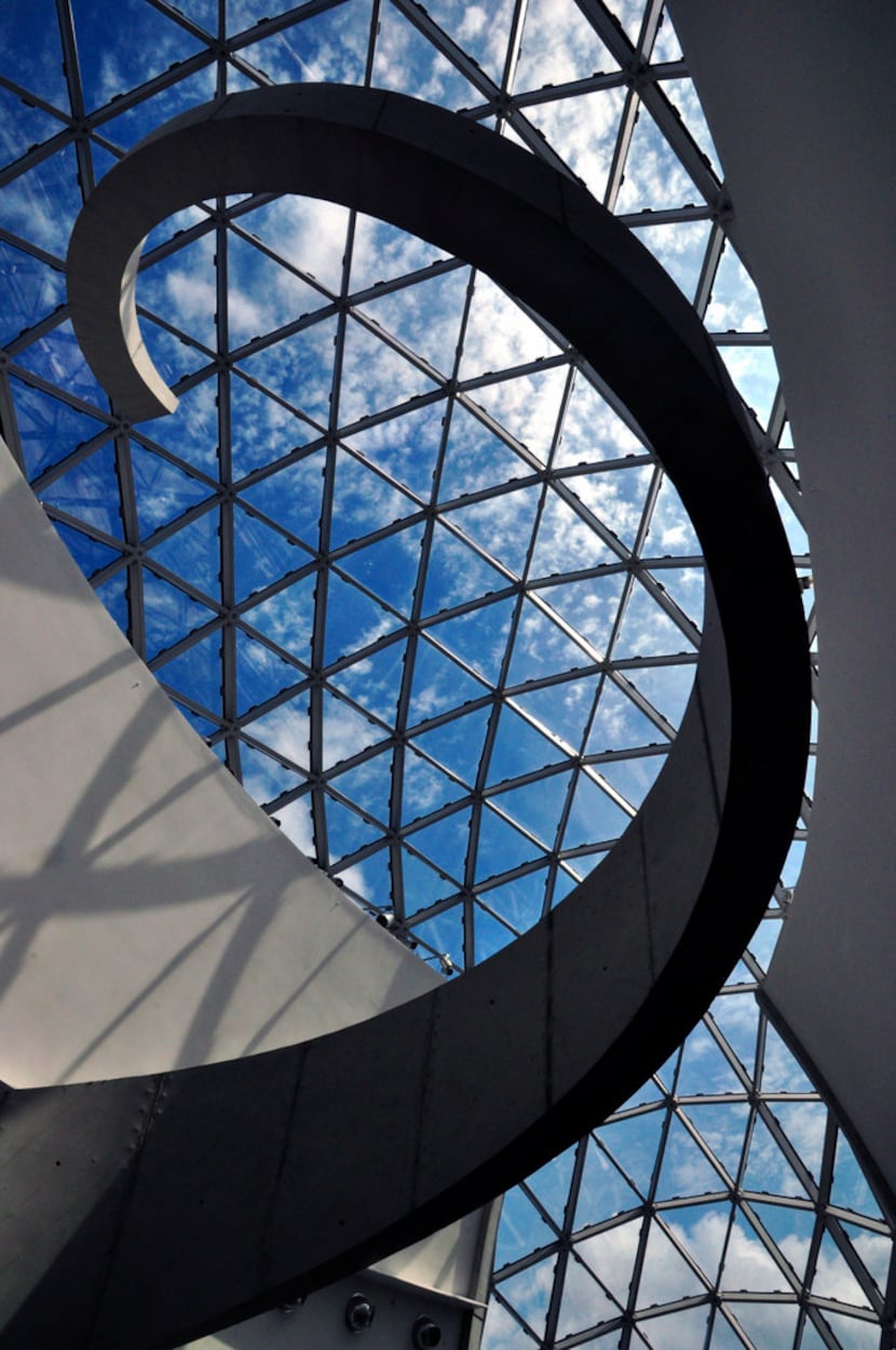The atrium inside the Dali Museum in St. Petersburg, Fla., reflects the style of the Spanish...