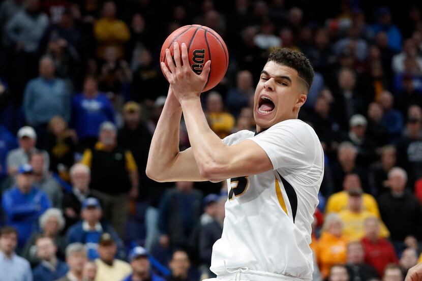 FILE - In this March 8, 2018, file photo, Missouri's Michael Porter Jr. pulls down a rebound...