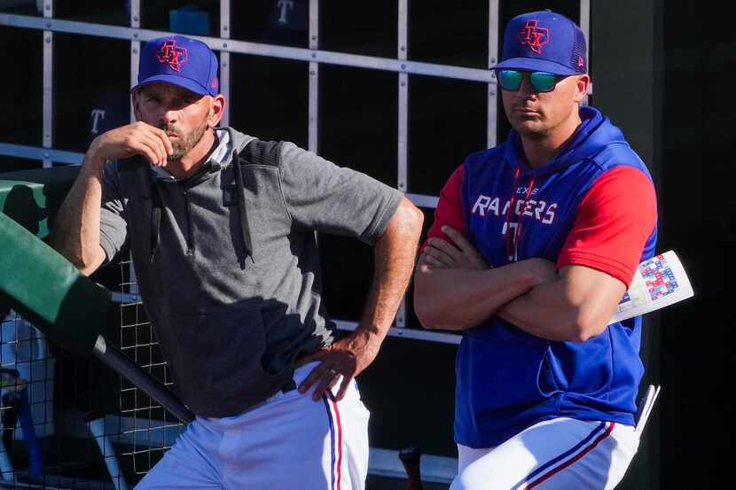 Texas Rangers manager Chris Woodward (left) and bench coach/offensive coordinator Donnie...