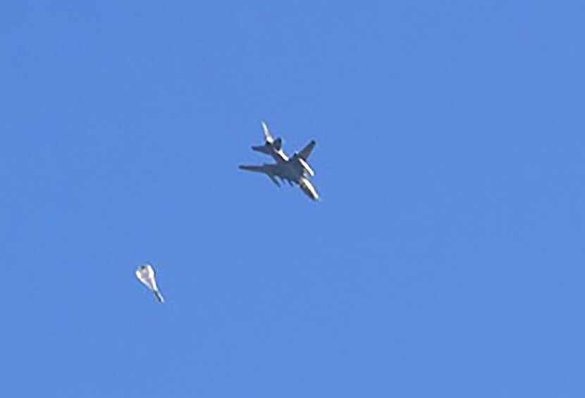 A fighter jet used by the Syrian government forces drop a bomb during their assault to...