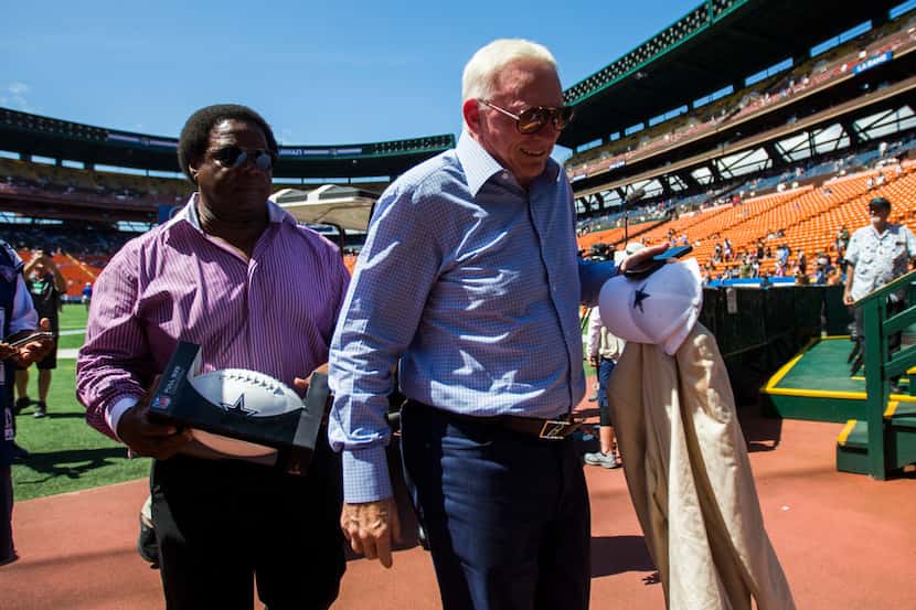 Dallas Cowboys owner Jerry Jones enters the stadium before an NFL preseason game between the...