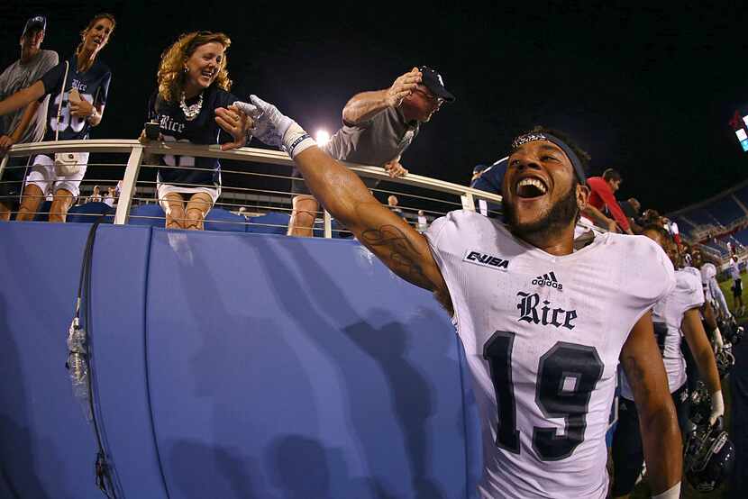 BOCA RATON, FL - OCTOBER 10: VJ Banks #19 of the Rice Owls celebrates with fans after the...