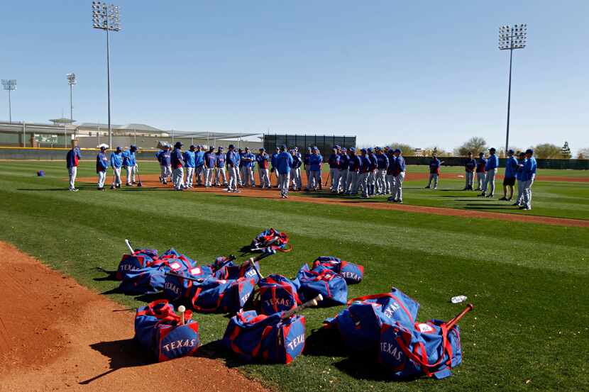 10 THINGS TO KNOW AS RANGERS OPEN SPRING TRAINING: When Rangers' pitchers and catchers...