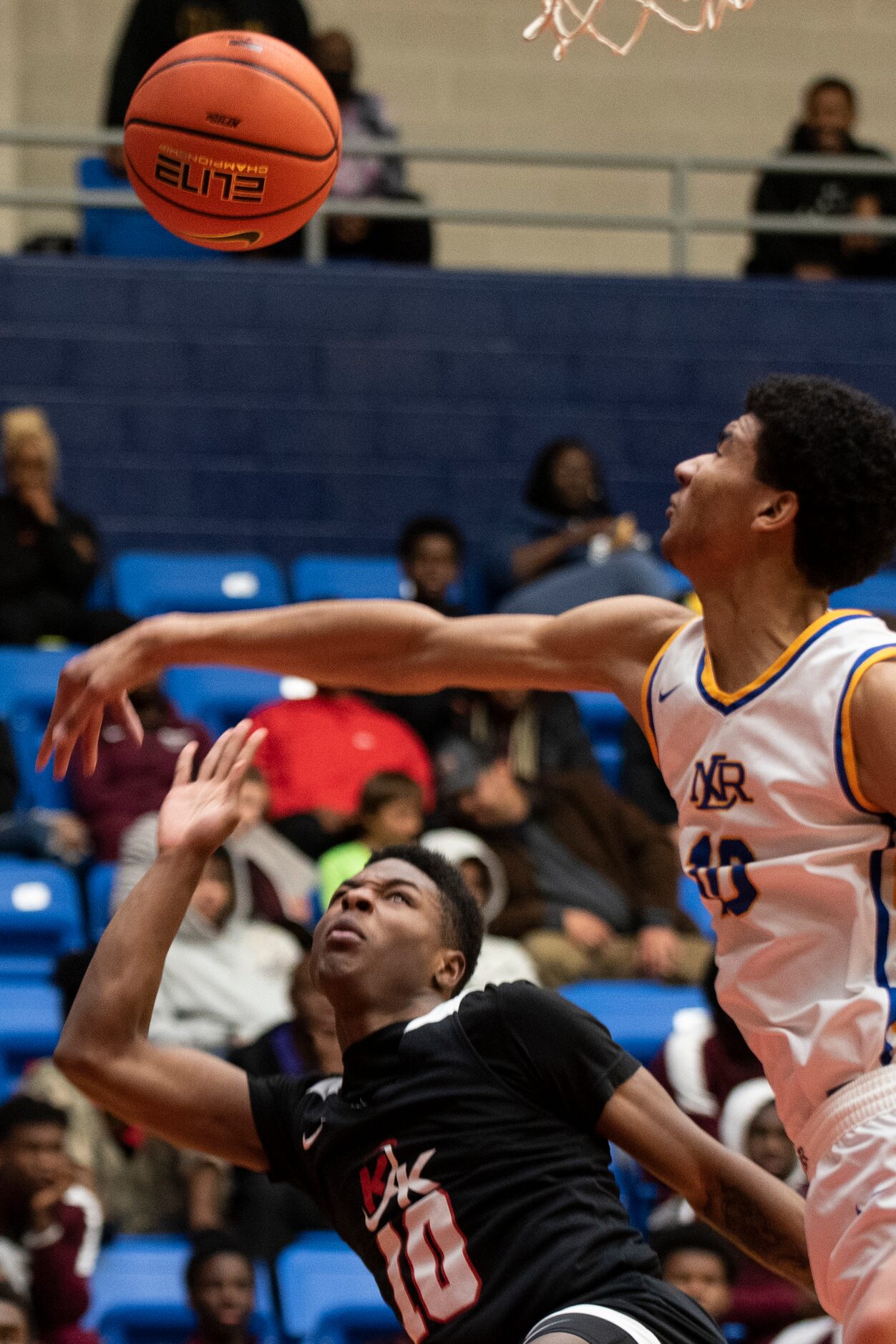 Kimball senior Trey Clayton (10) is blocked by North Little Rock senior Kelel Ware (10)...