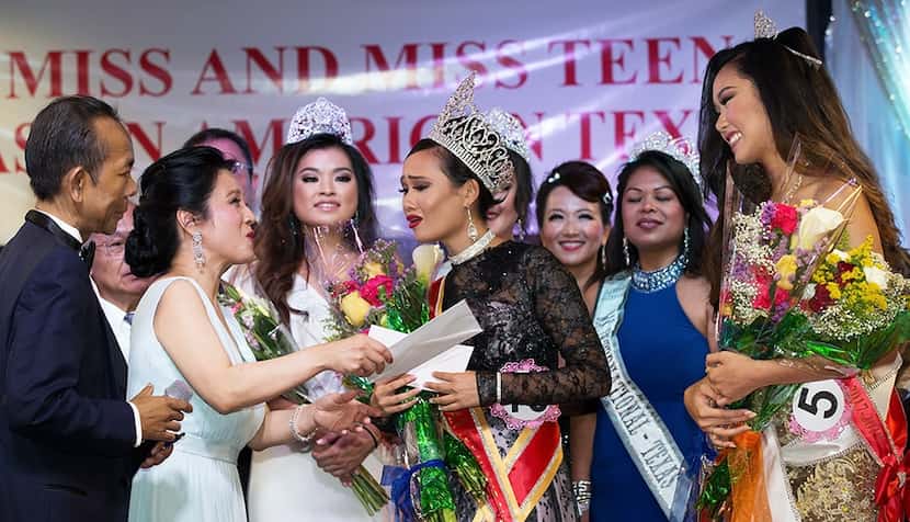 Averie Bishop reacts after being crowned Miss Asian American Texas.