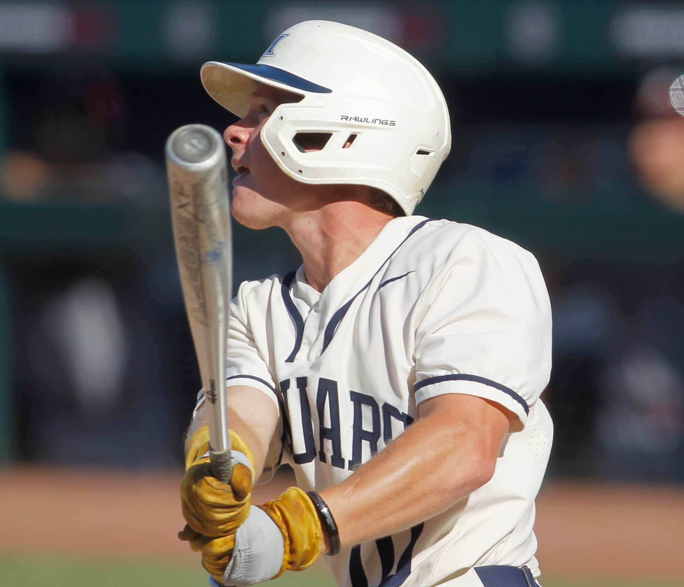 Flower Mound outfielder Tell Moter (10) watches a long drive headed to the outfield during...