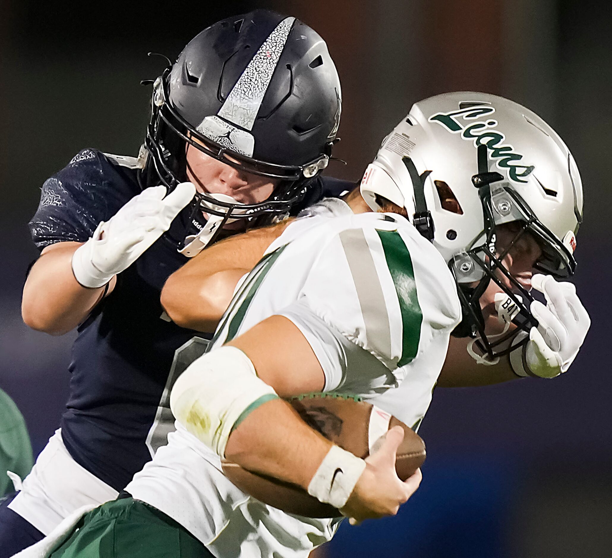 Frisco Reedy quarterback Jake Ferner (10) is brought down by Frisco Lone Star linebacker ...