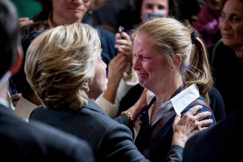 Democratic presidential candidate Hillary Clinton consoled a supporter after speaking at the...