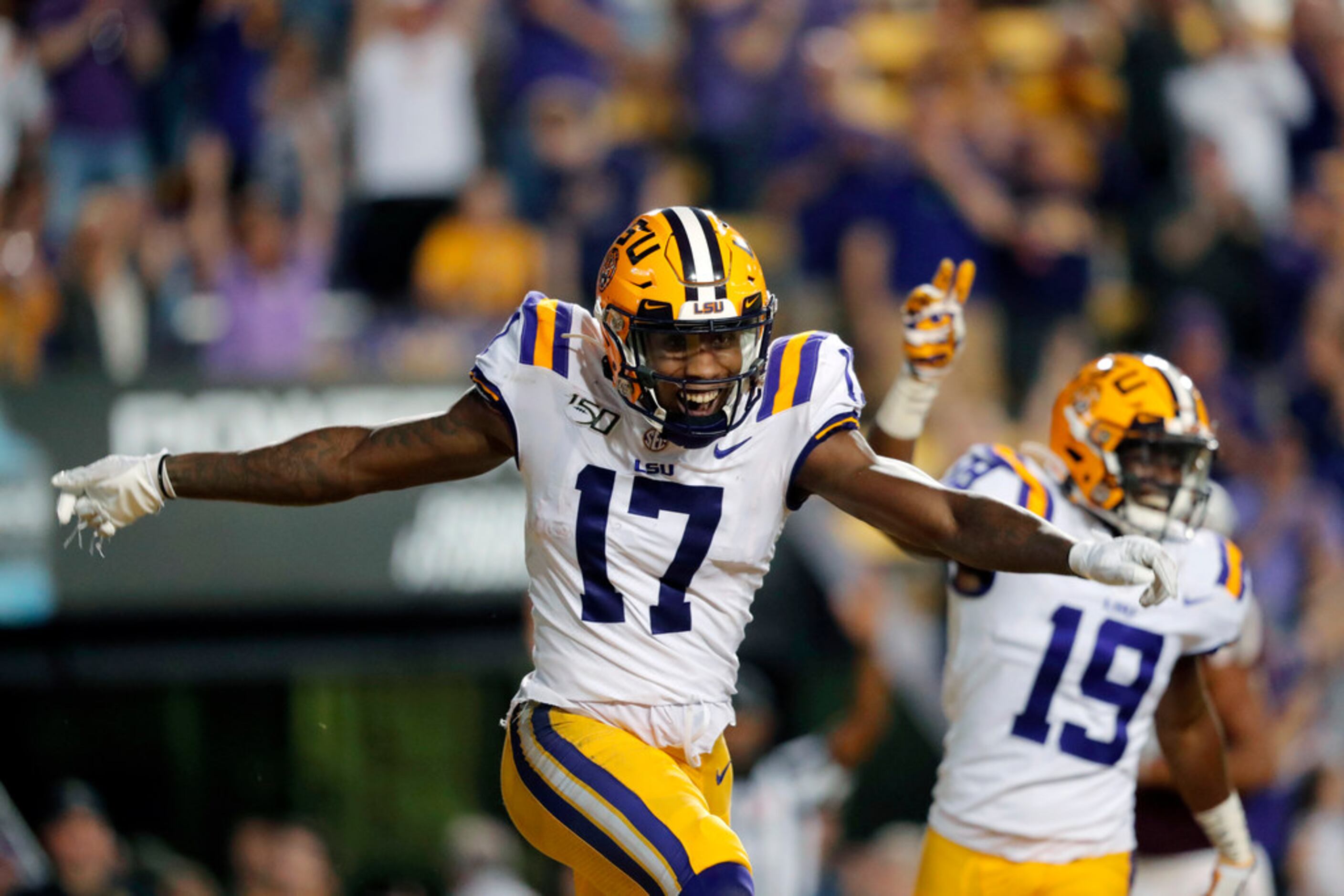 LSU wide receiver Racey McMath (17) celebrates his touchdown reception with wide receiver...