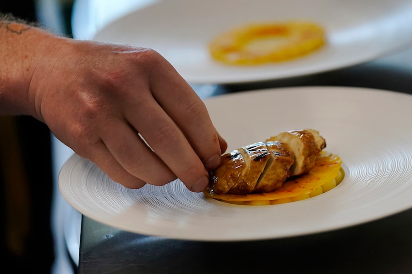 Chef Zach Tyndall prepares Good Meat's cultivated chicken at the Eat Just office in Alameda,...