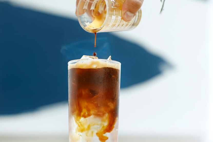 An espresso tonic drink is prepared at Katy Coffee Lab.