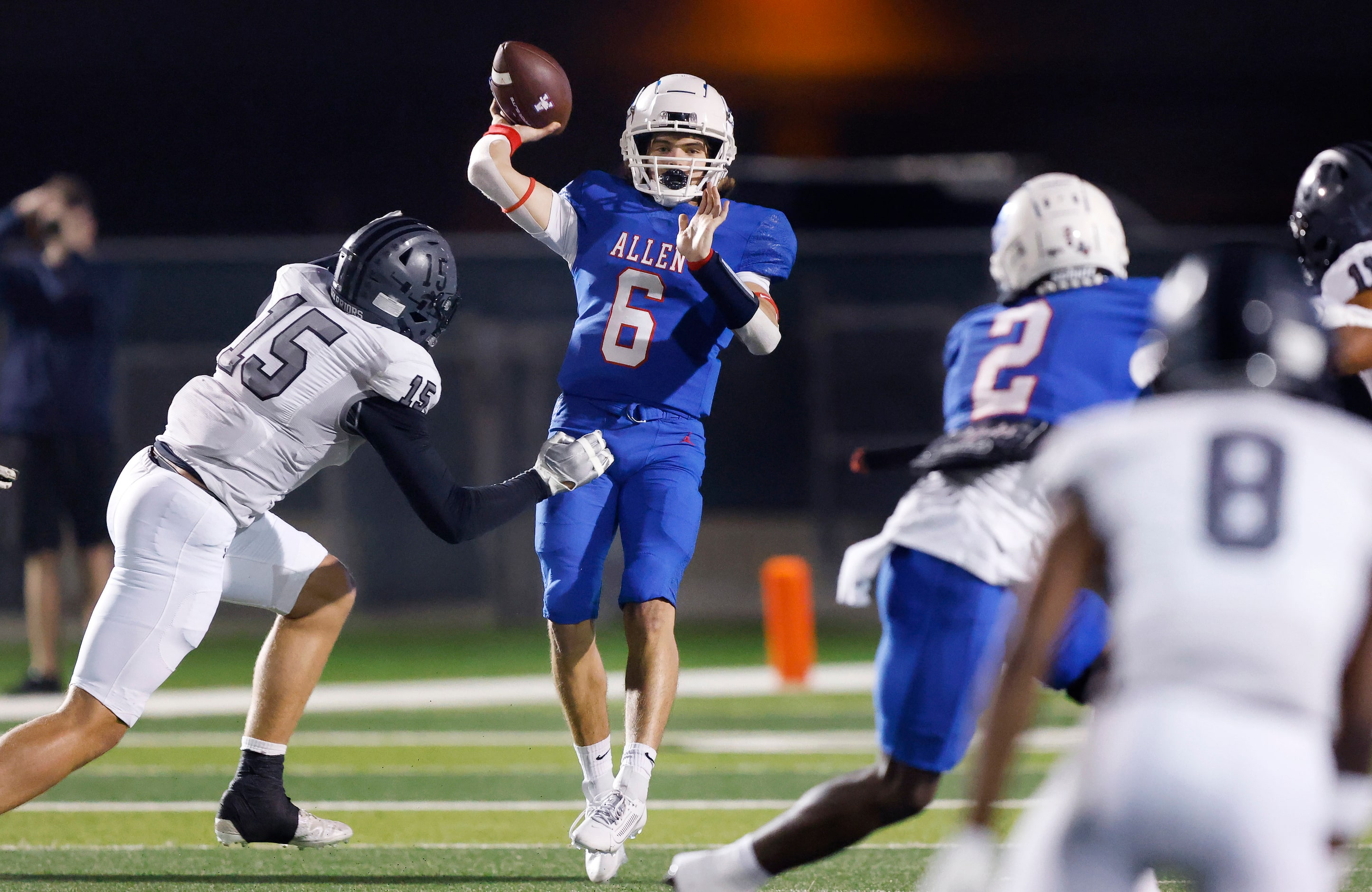 Allen quarterback Dylan Chapman (6) tosses a first quarter pass against Arlington Martin’s...