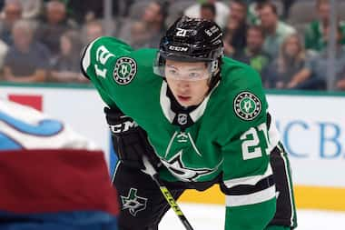 Dallas Stars left wing Jason Robertson (21) gets ready for a face off against the Colorado...