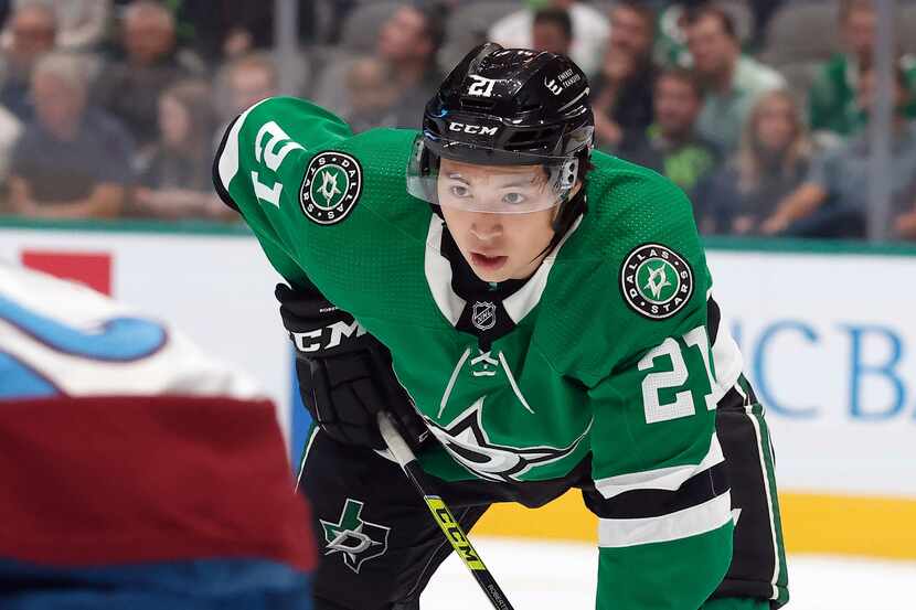 Dallas Stars left wing Jason Robertson (21) gets ready for a face off against the Colorado...