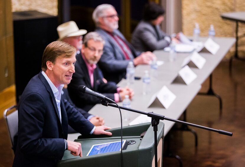 Gubernatorial candidate Andrew White, left, speaks during a democratic gubernatorial...