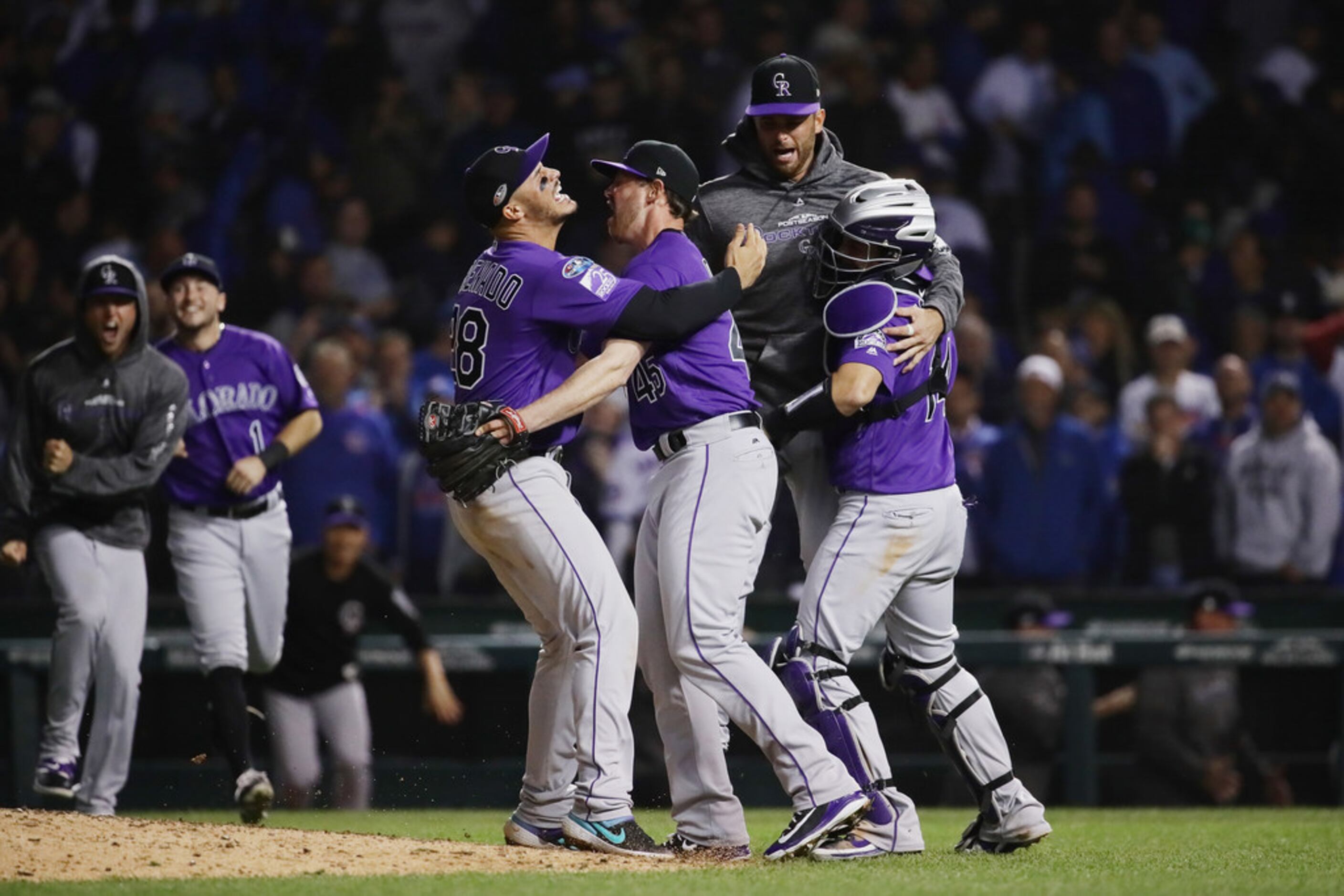 Rockies beat Cubs in NL Wild Card on Tony Wolters' single in 13th