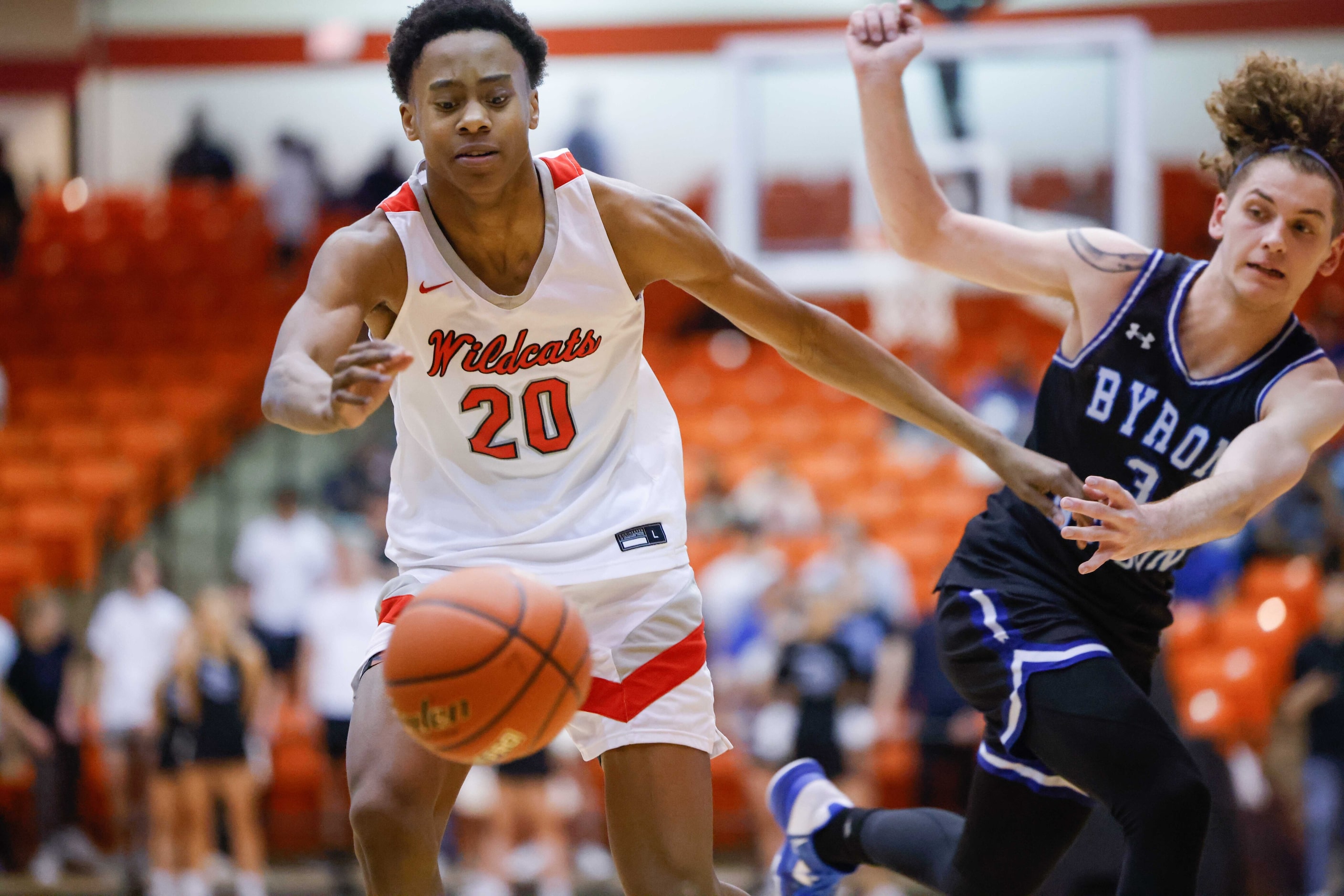 Lake Highlands High School' Tre Johnson (20) tries to recover the ball against Byron Nelson...