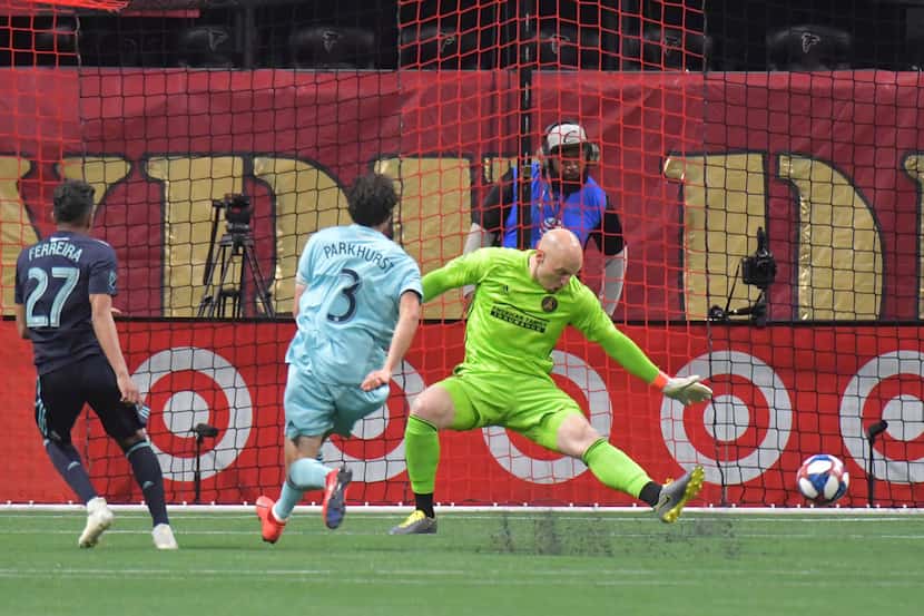 FC Dallas forward Jesus Ferreira (27) makes a shot on goal past Atlanta United goalkeeper...