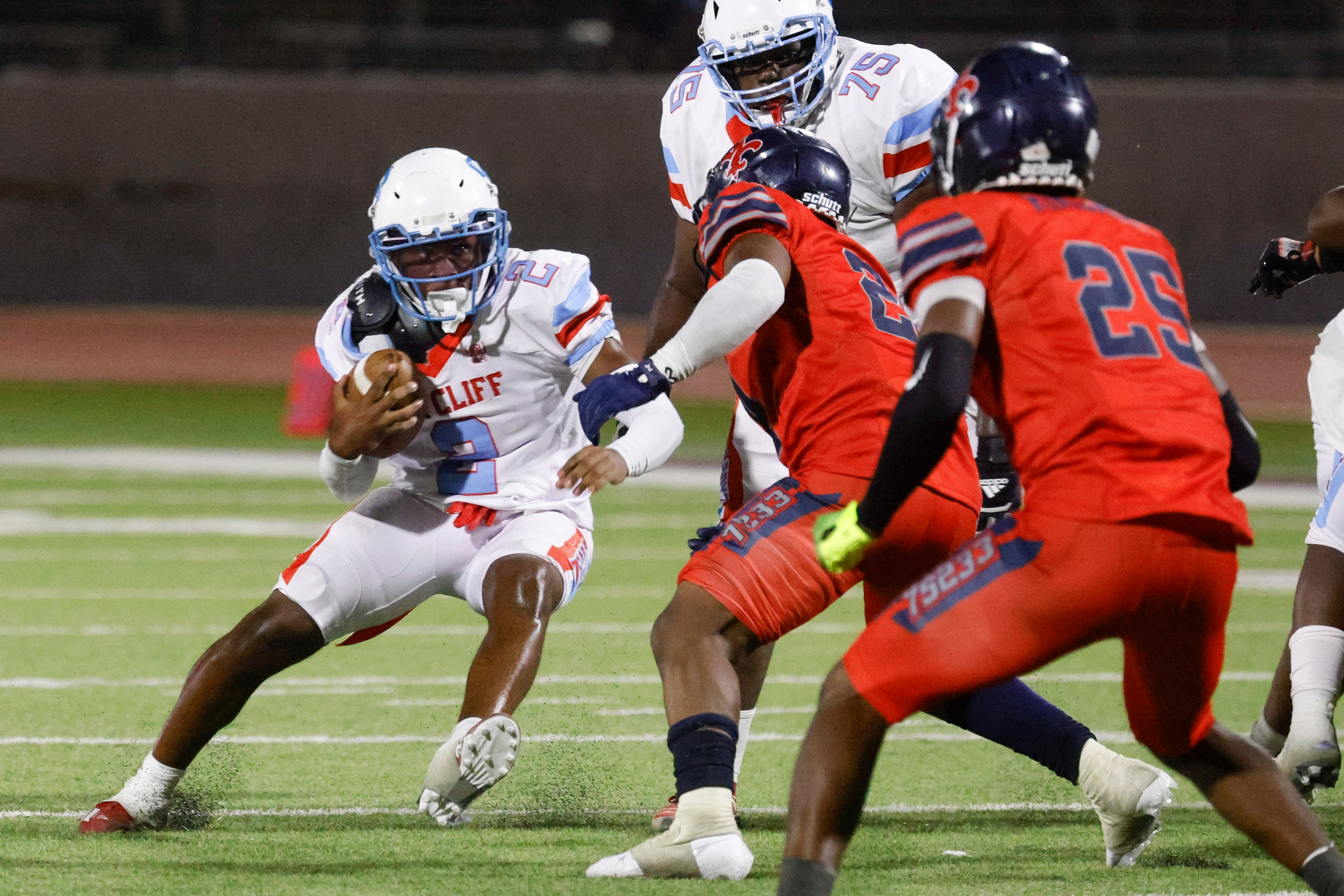 Carter high’s Camden Patterson (2) runs for a yardage against Kimball high during the second...