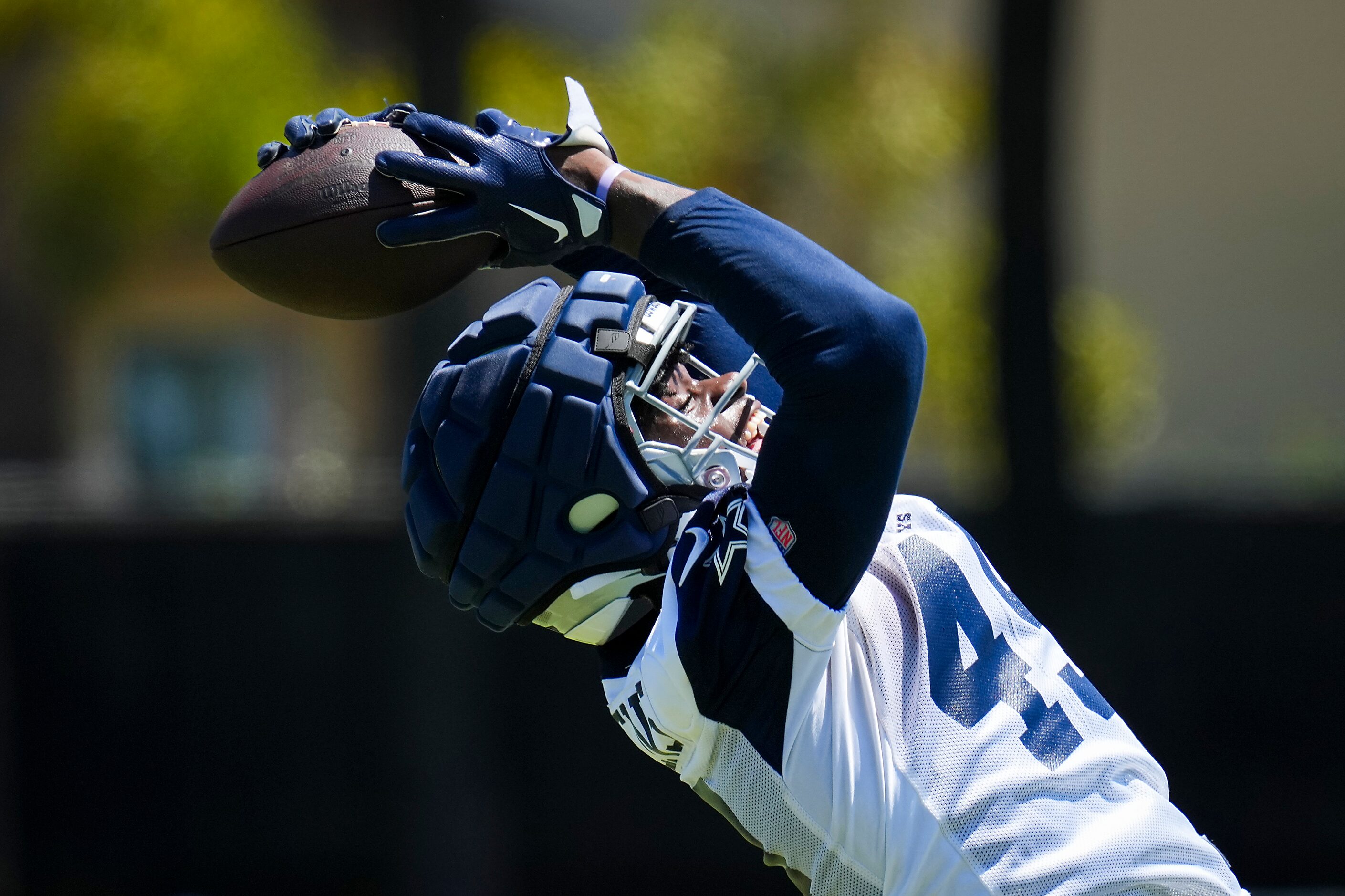 Dallas Cowboys tight end John Stephens Jr. (49) catches a pass during a training camp...