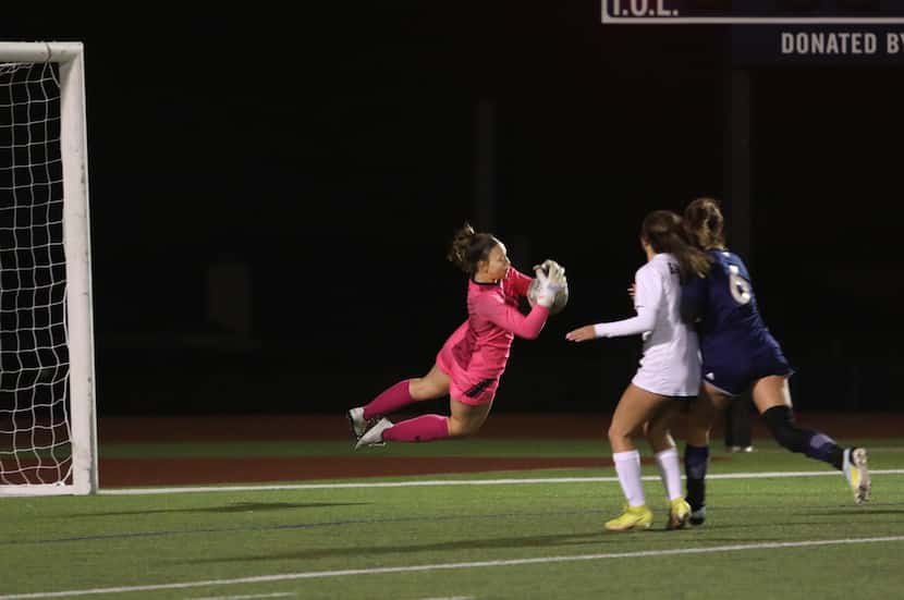 Wylie East High School player #0, Breanna Wooten, defends the goal during a soccer game...