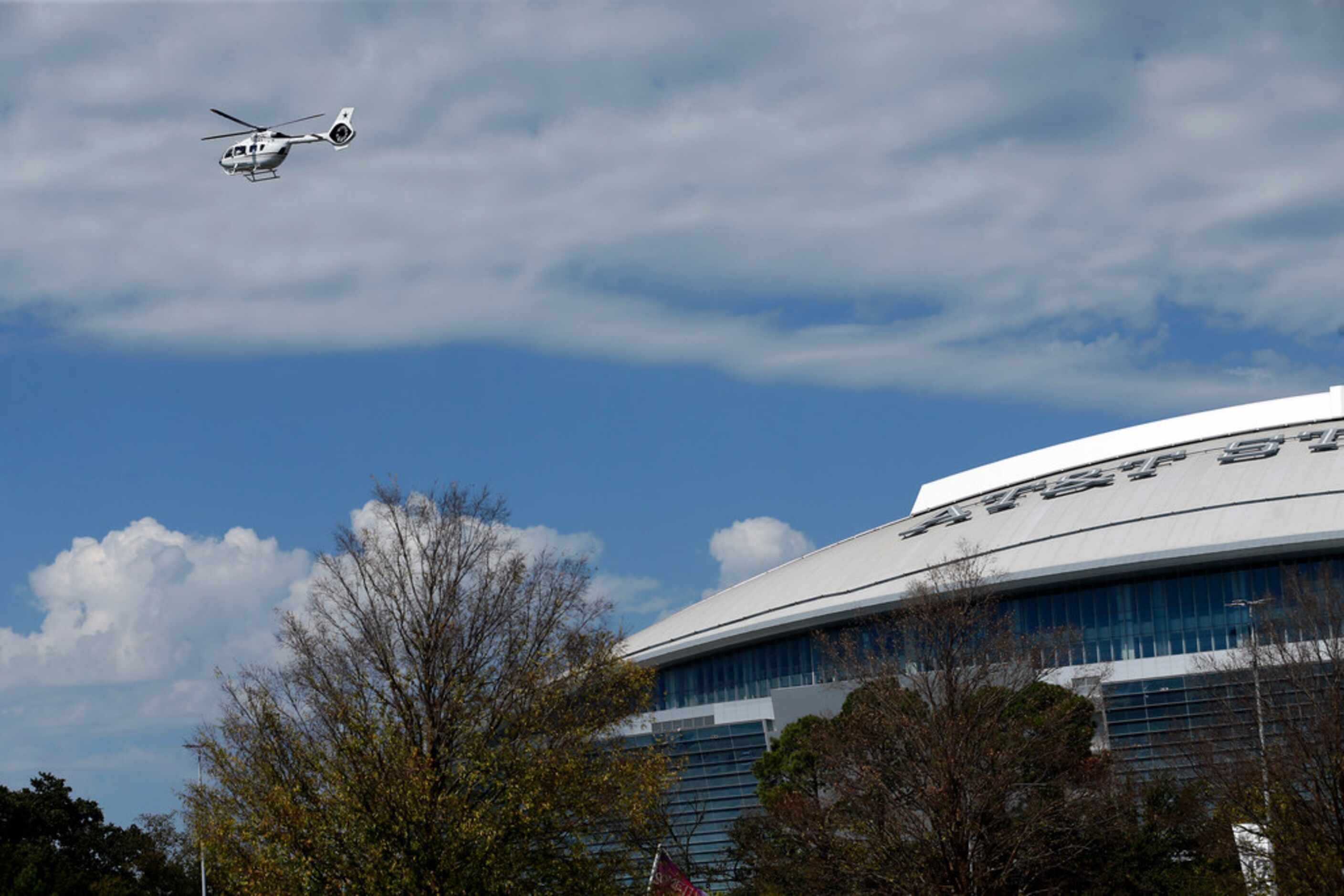 Dallas Cowboys owner Jerry Jones' helicopter approaches AT&T Stadium in Arlington, Texas,...