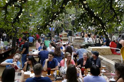 Escape the Uptown hustle at Katy Trail Ice House. (The hustle will be waiting out there in...
