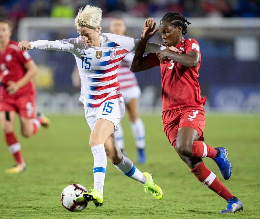 FRISCO TX - OCTOBER 17: USA forward Megan Rapinoe (#15) dribbles up field during the...