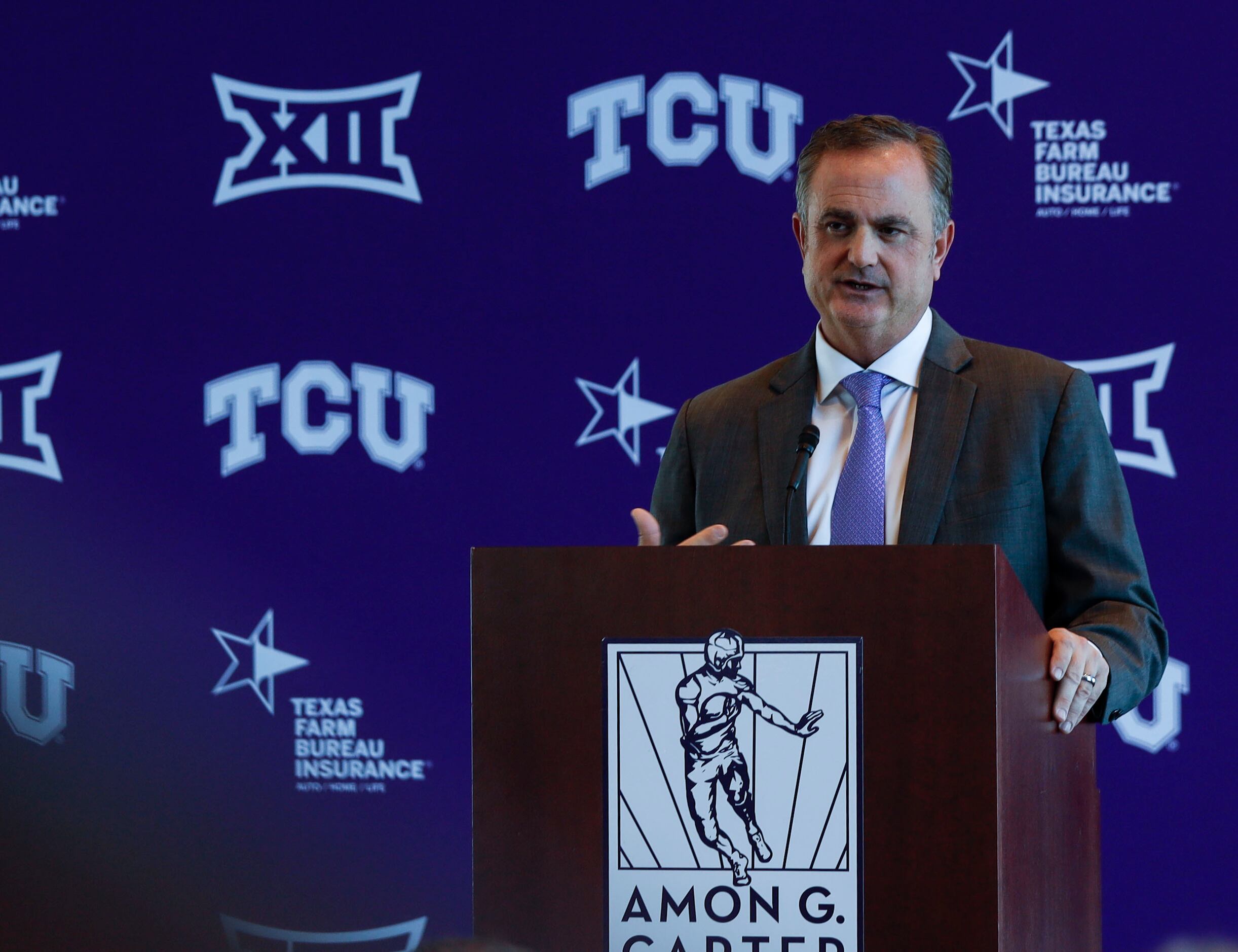 Texas Christian University's head football coach, Sonny Dykes, speaks at a news conference...