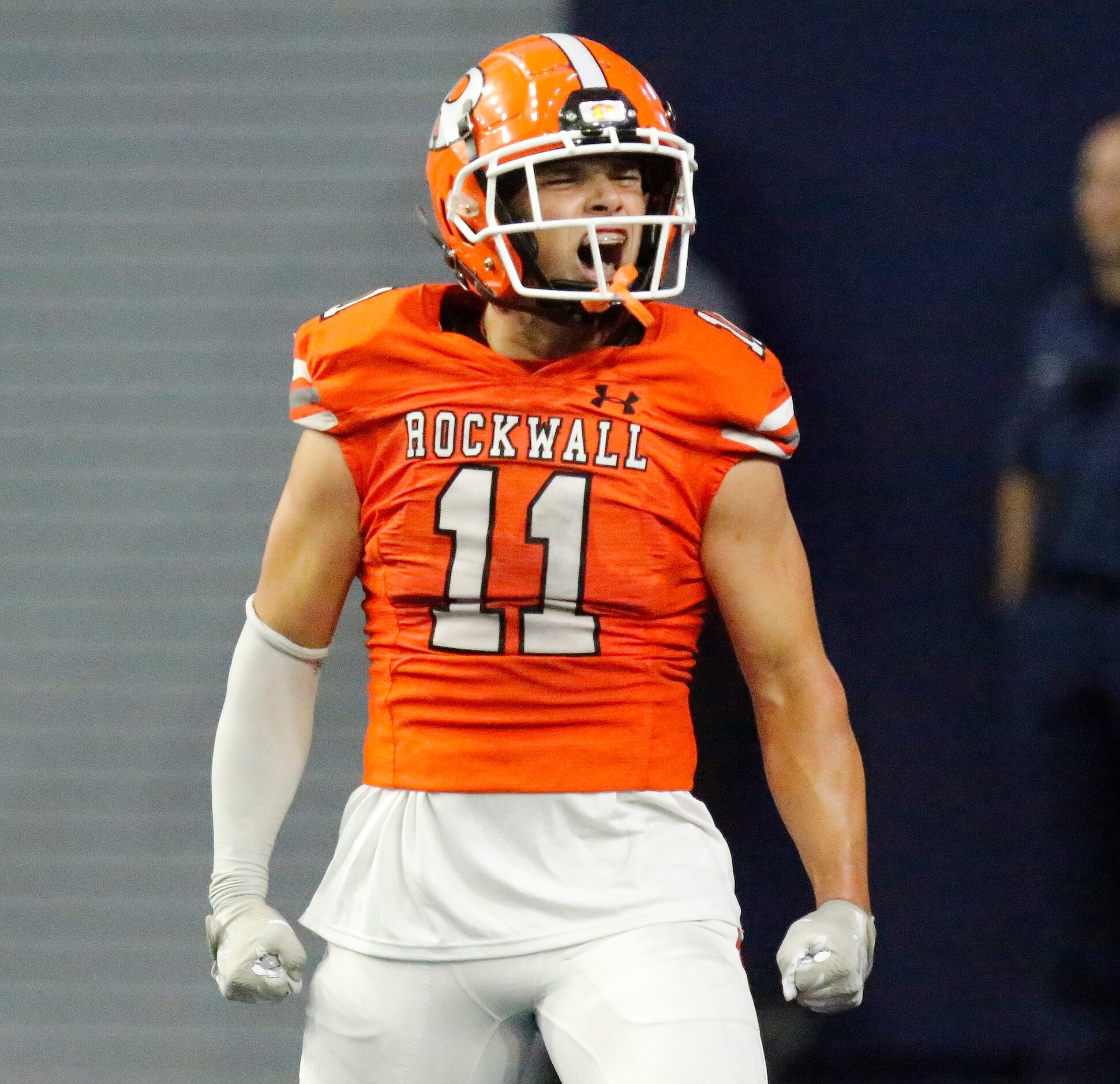 Rockwall High School free safety Jake Overstreet (11) celebrates a defensive stop during the...