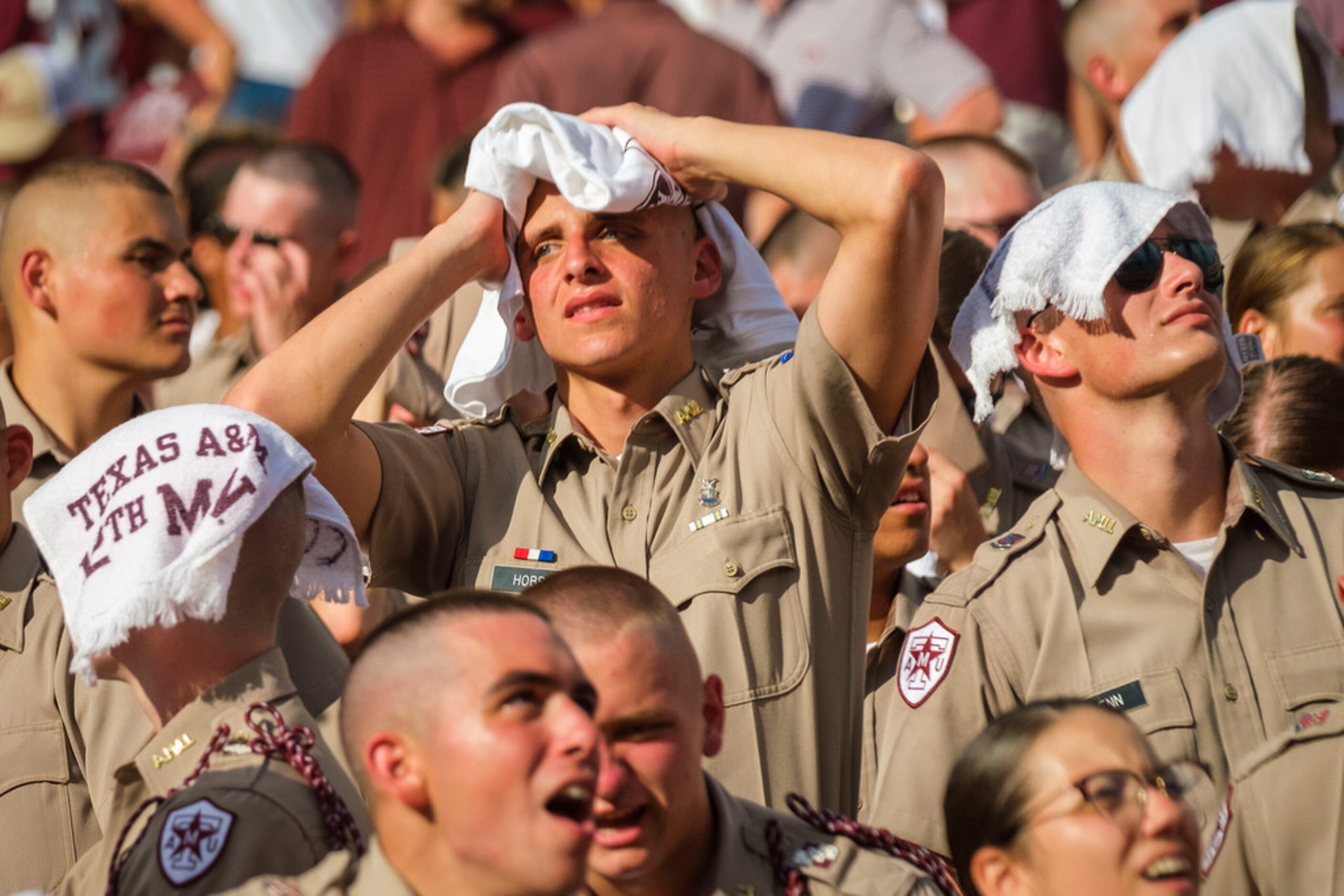 Members of the Texas A&M Corps of Cadets react after a Auburn touchdown during the second...