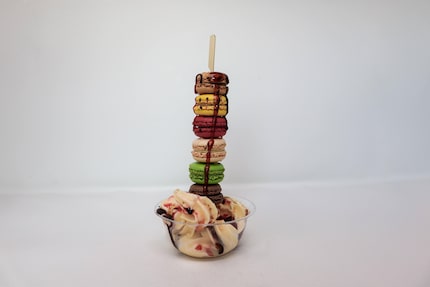 The macaron ice cream tower, a new item for the 2024 State Fair of Texas, is tall. 