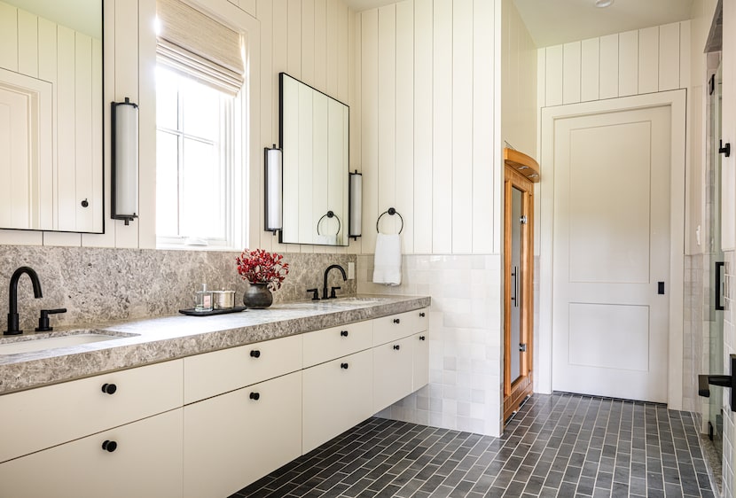 Designer Alexis Pearl designed a dedicated insert in this primary bathroom where the sauna...