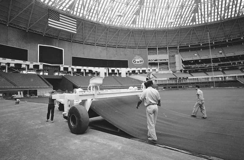 This is a 1966 file photo showing artificial turf being installed at the Astrodome in Houston. 