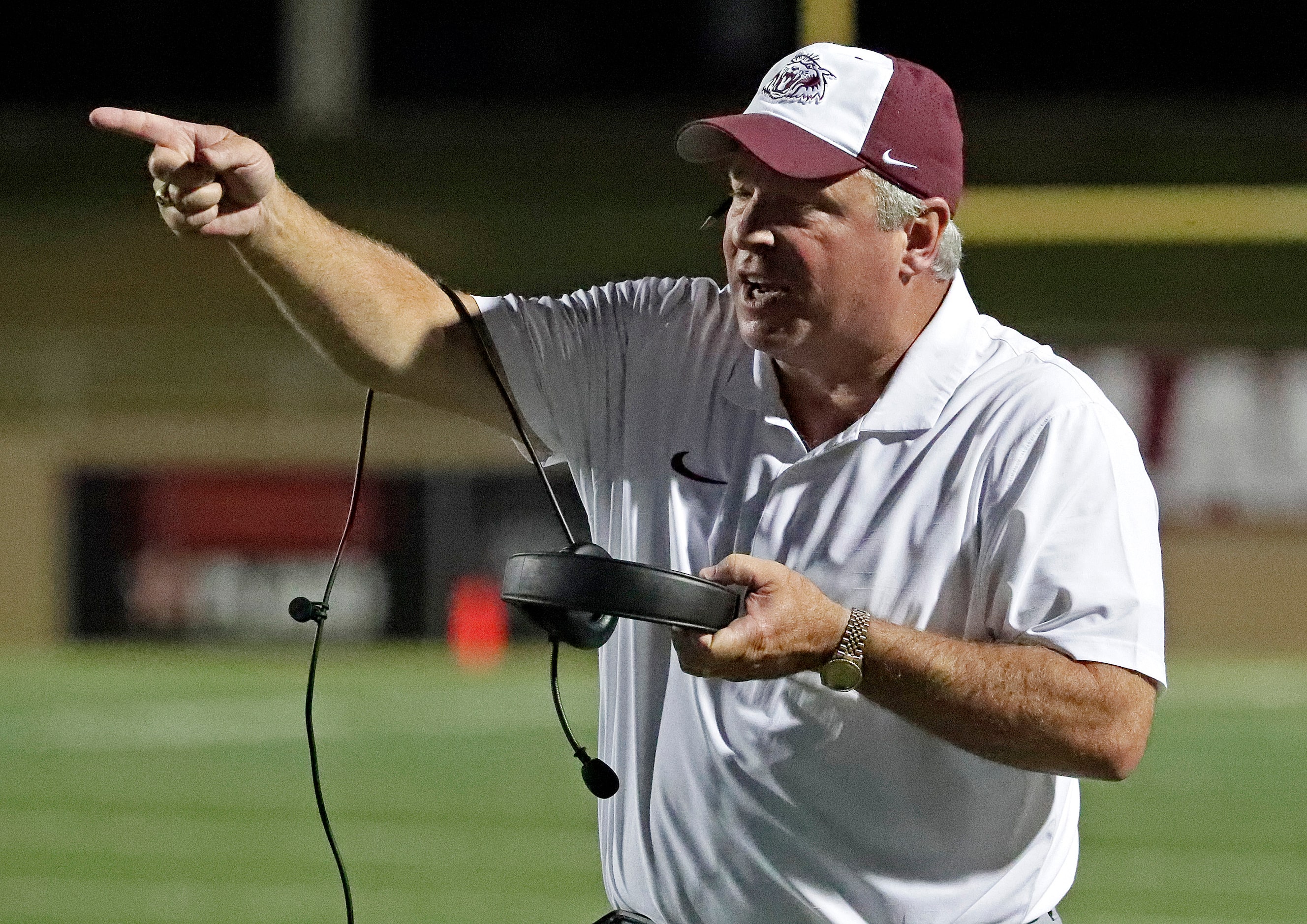 Plano High School head coach Cody White makes a point to a ref during the first half as...