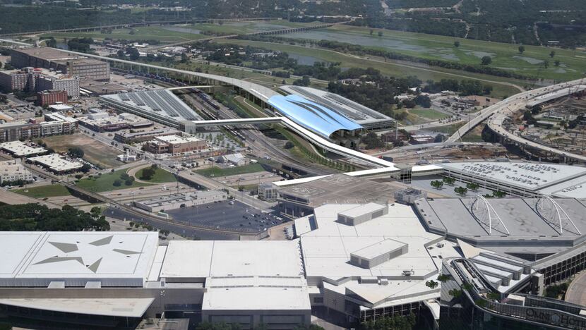 This conceptual rendering shows a North Texas passenger station (center, with blue roof) in...
