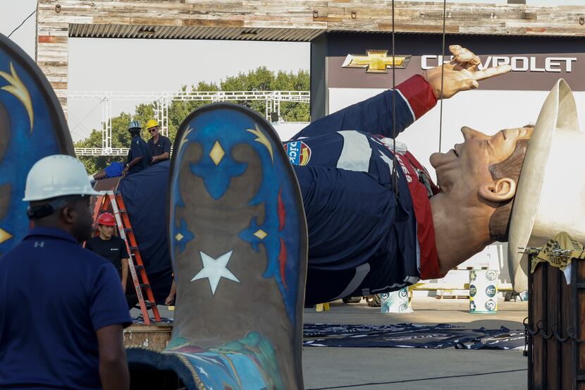 Crews work to prepare Big Tex to be installed at The State Fair of Texas, Friday, Sept. 23,...