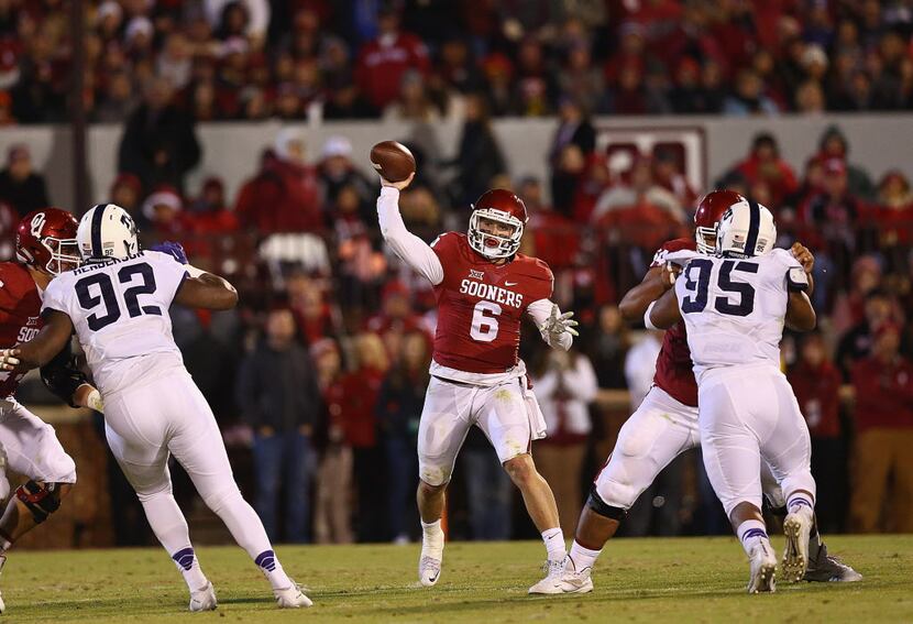 NORMAN, OK - NOVEMBER 21:  Baker Mayfield #6 of the Oklahoma Sooners throws the ball against...