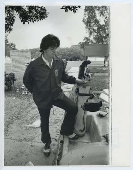 Staff photograph of a caddy at Glen Lakes Country Club, date unknown.