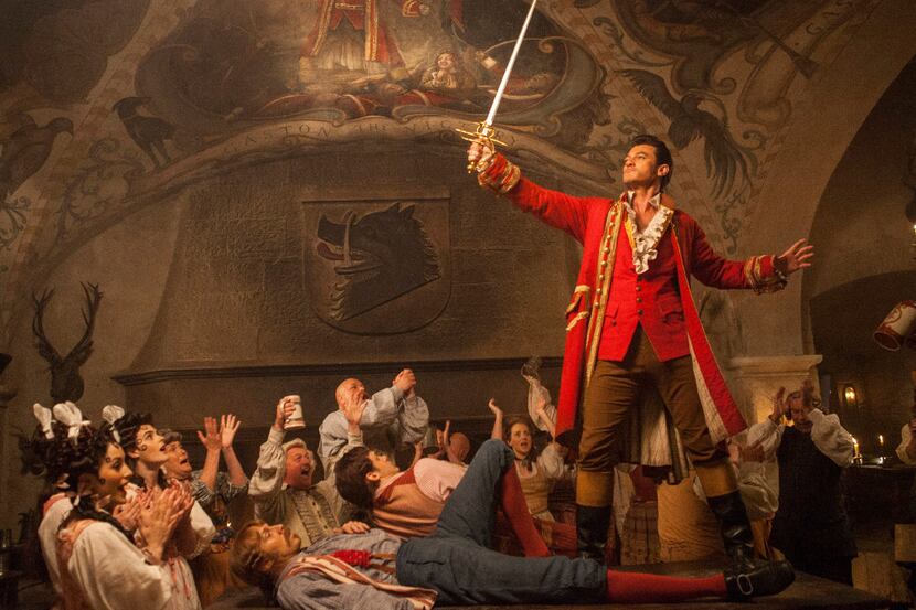 This image released by Disney shows Luke Evans in a scene from "Beauty and the Beast."