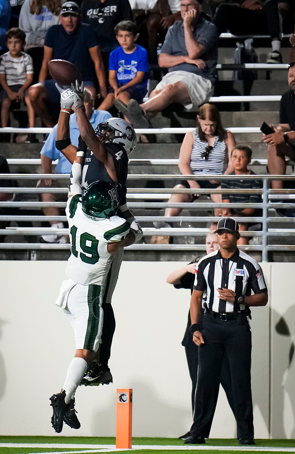 Prosper defensive back Bo Mongaras (19) breaks up a pass intended for Denton Guyer wide...