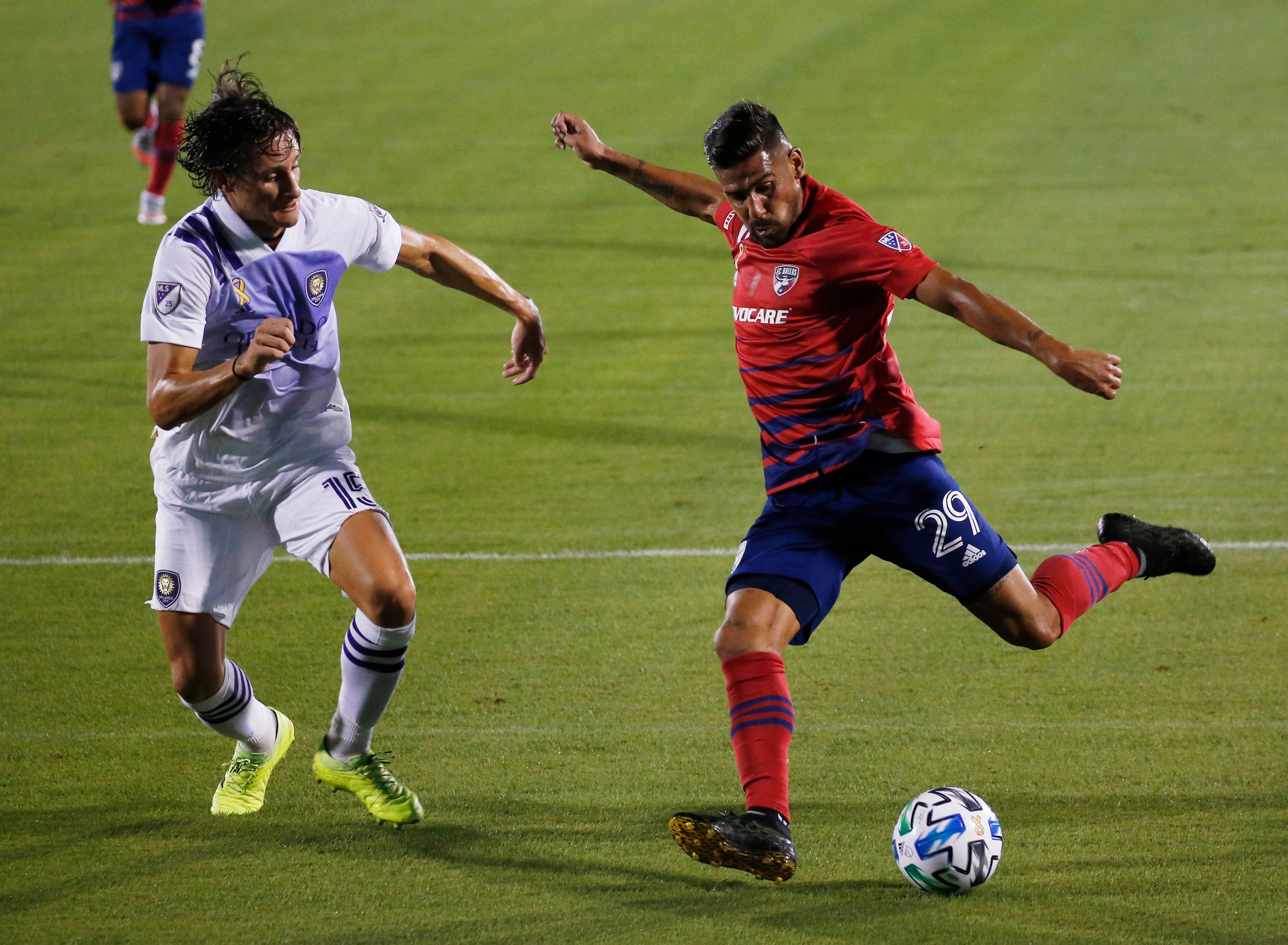 FC Dallas forward Franco Jara (29) attempts a shot in front of Orlando City defender Rodrigo...