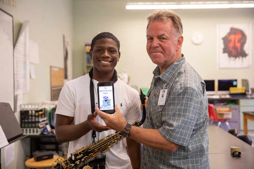 Donovan Spruiells and Donald Fabian pose with the Monster Musician Reader app at the Dallas...